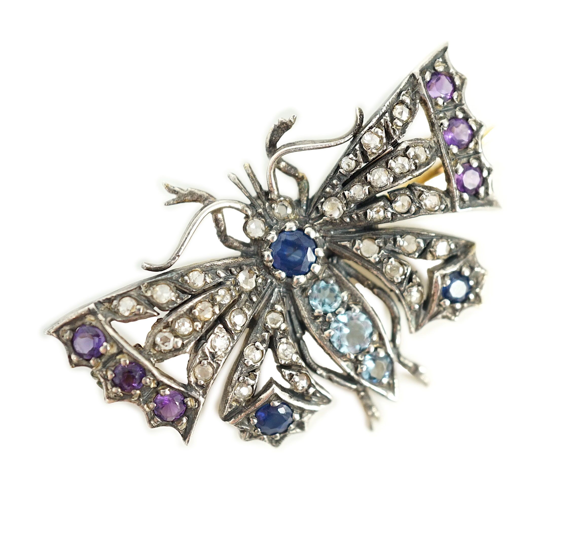 A Victorian gold and silver, diamond, amethyst, sapphire and aquamarine? set butterfly brooch